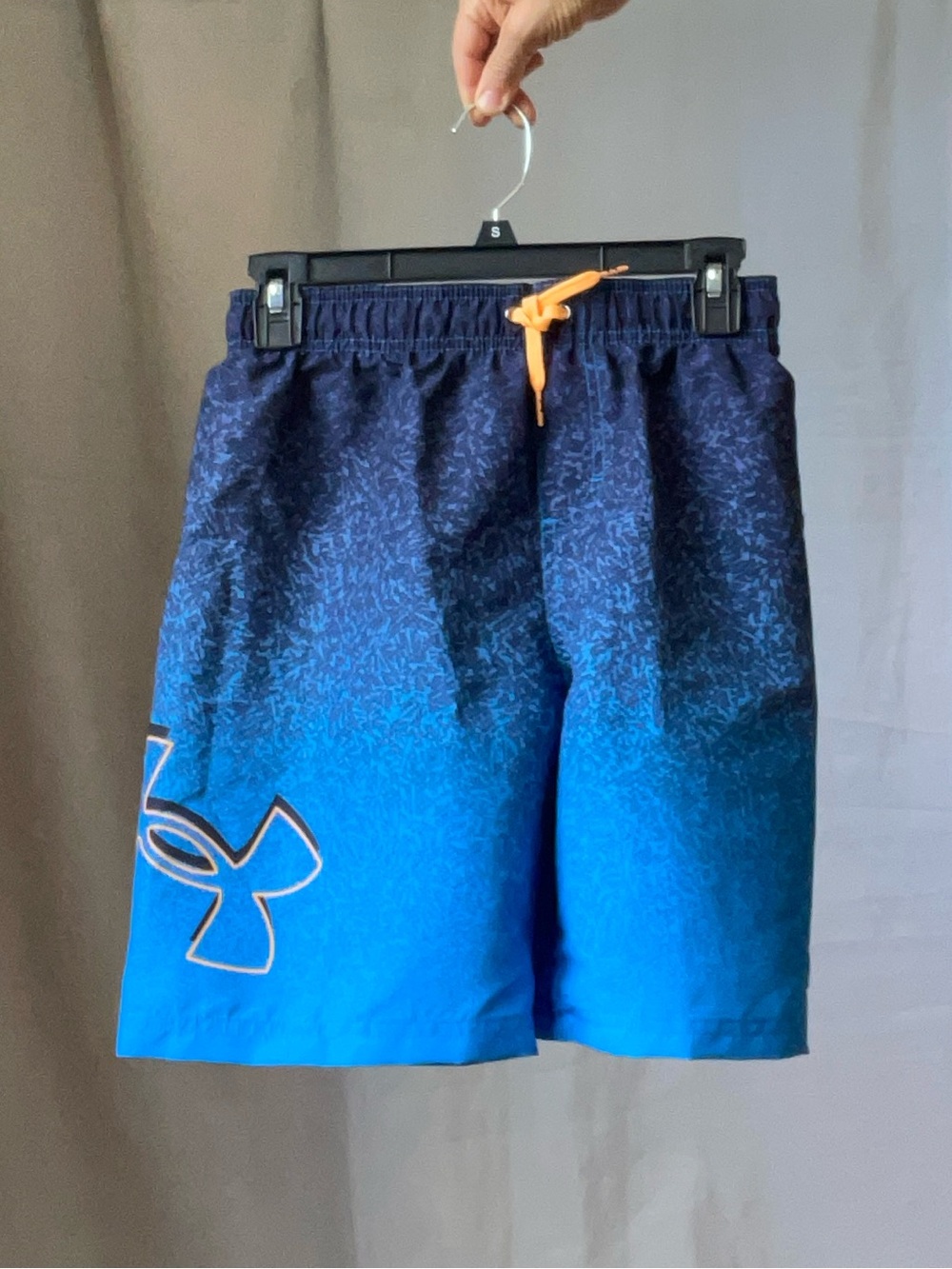 Under Armour swim trunks, size 14